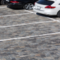 Landlord has assigned parking spaces for tenant vehicles to park.